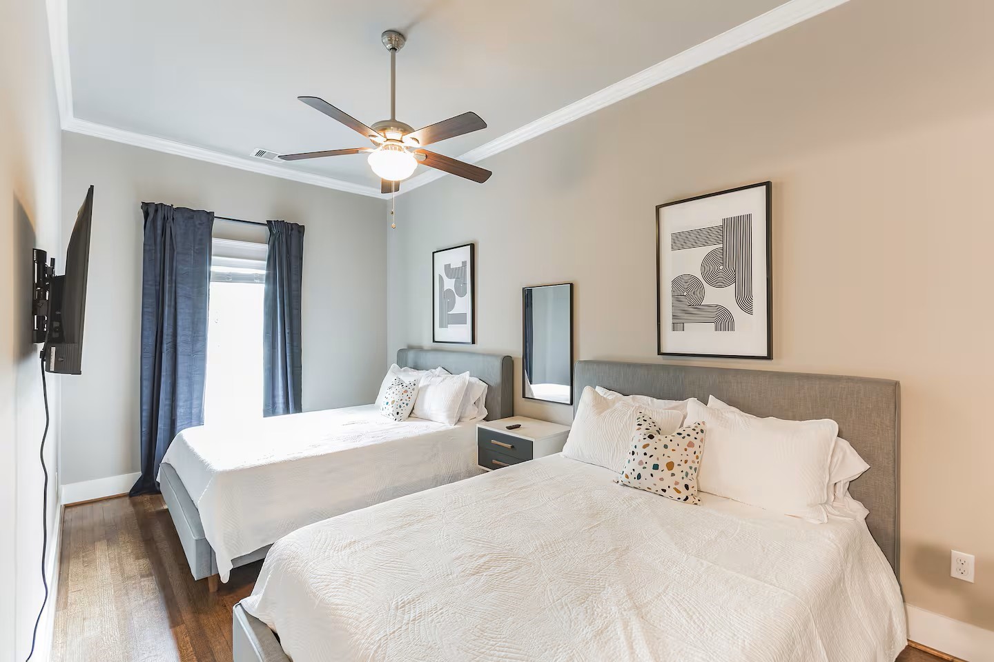 1006 Enid Street, Unit B Houston, TX 77009 - Photo 24 of 26 a bedroom with two beds and a table
