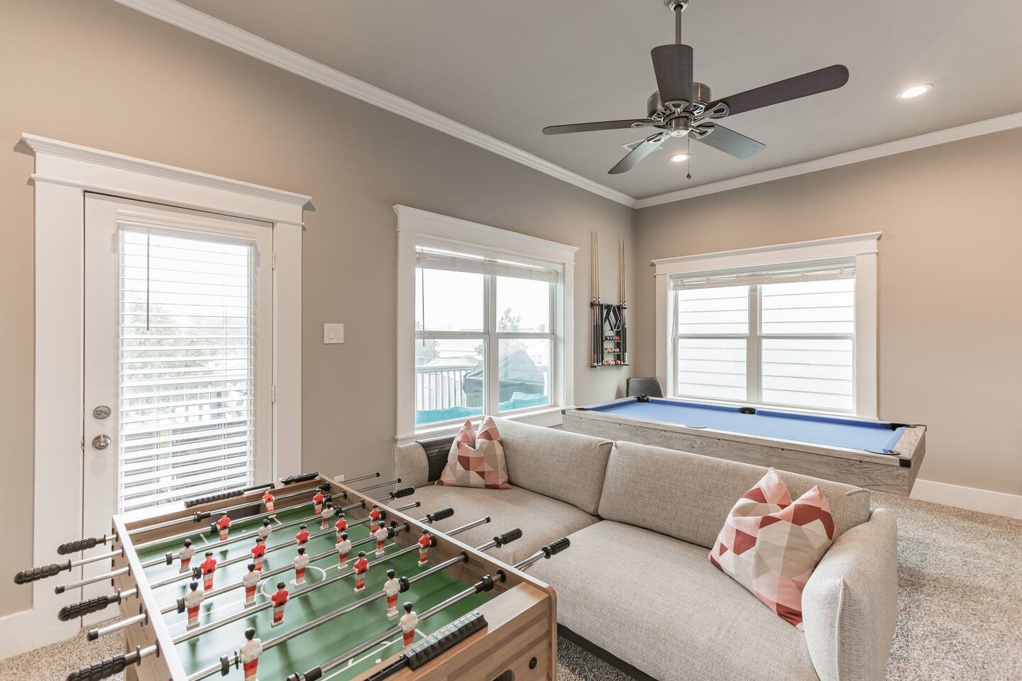 1006 Enid Street, Unit B Houston, TX 77009 - Photo 4 of 26 a bed room with a bed and a chandelier