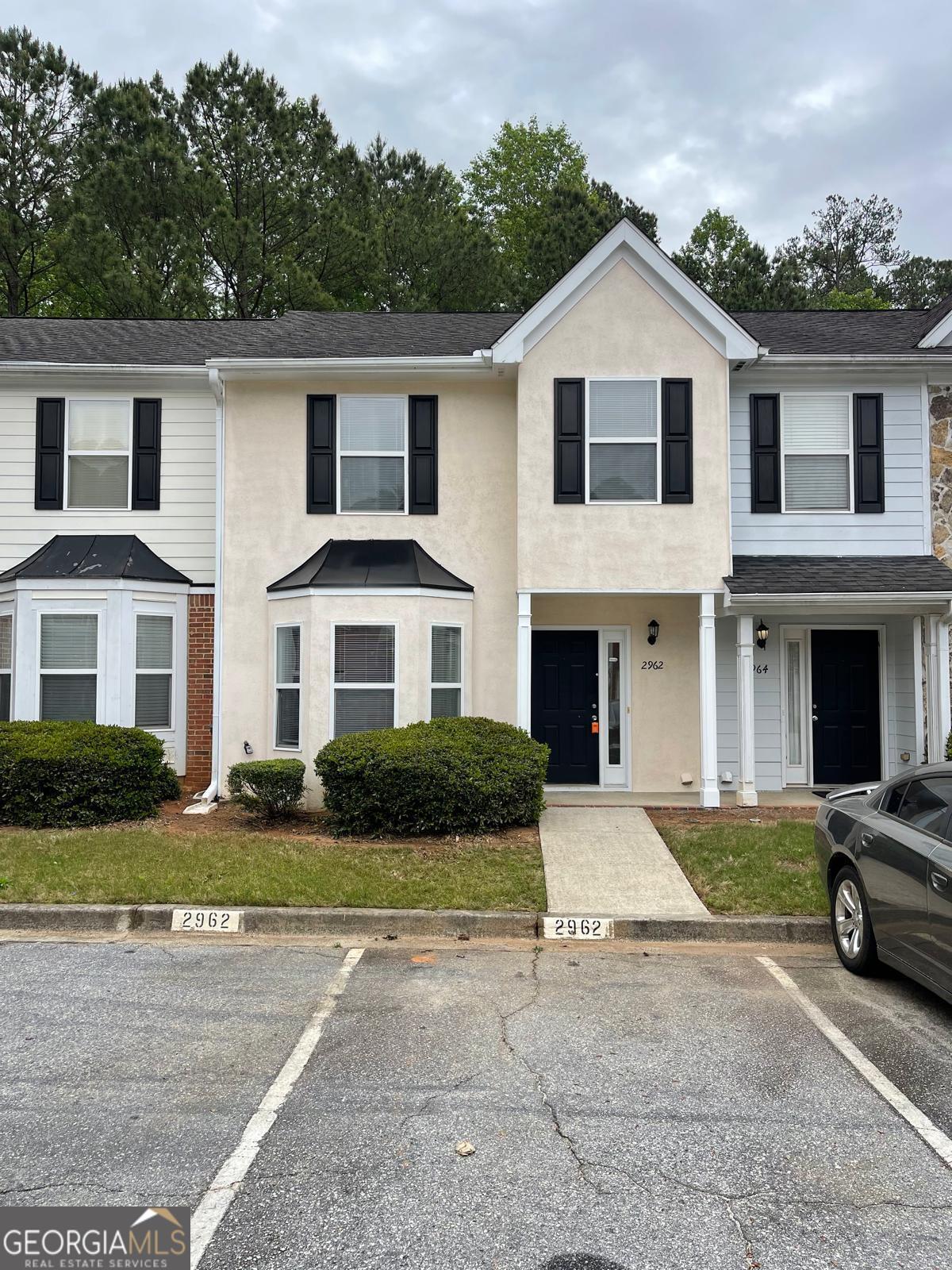 2962 Stonecrest Lane Lithonia, GA 30038 - Photo 1 of 27 2 assigned parking spaces right in front of home.
