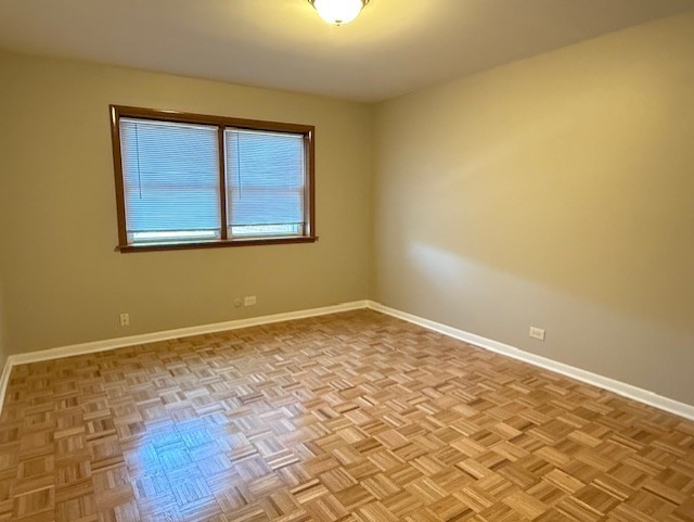 5240 Galitz Street, Unit 304 Skokie, IL 60077 - Photo 12 of 18 a view of empty room with window