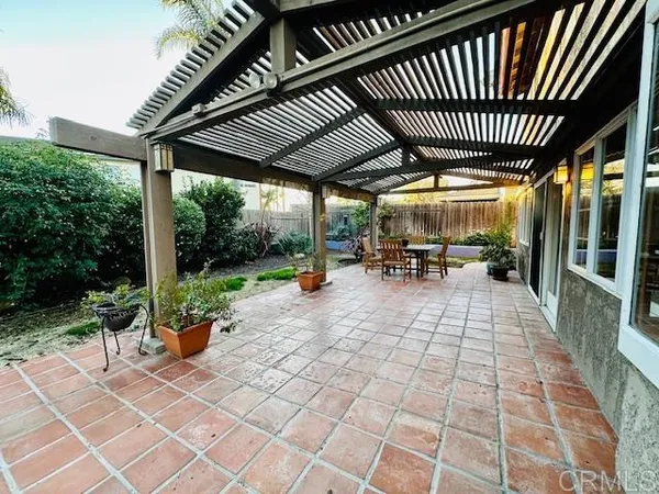 a view of a porch with furniture