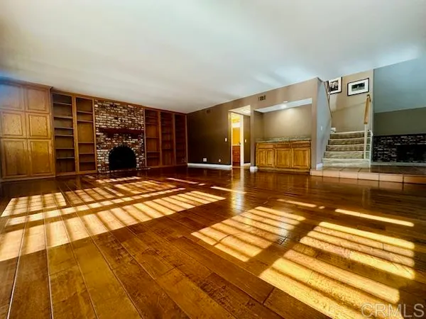 a view of a livingroom with a patio and a outdoor space