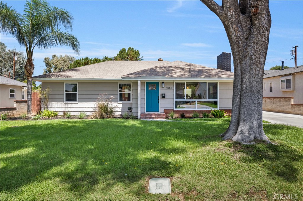 4561 Cover Street Riverside, CA 92506 - Photo 1 of 1 a front view of house with yard and green space