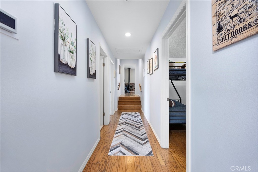 26511 Teal Court Tehachapi, CA 93561 - Photo 36 of 68 a view of a bedroom with a bed and stairs