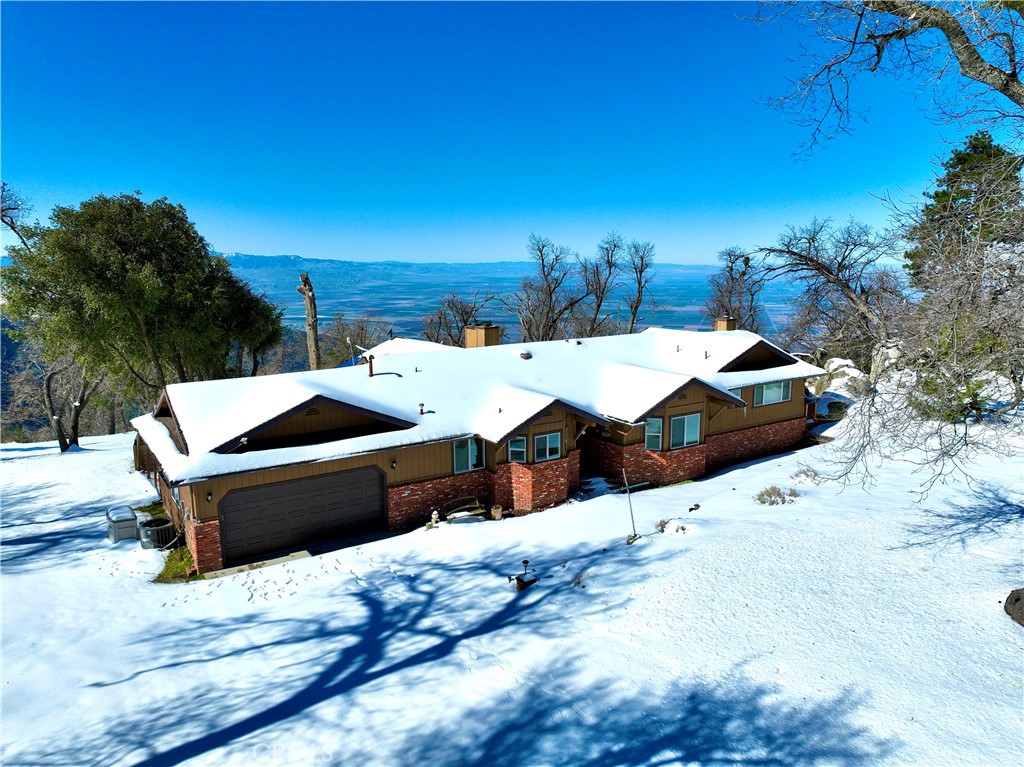 26511 Teal Court Tehachapi, CA 93561 - Photo 6 of 68 a view of a terrace with a barbeque