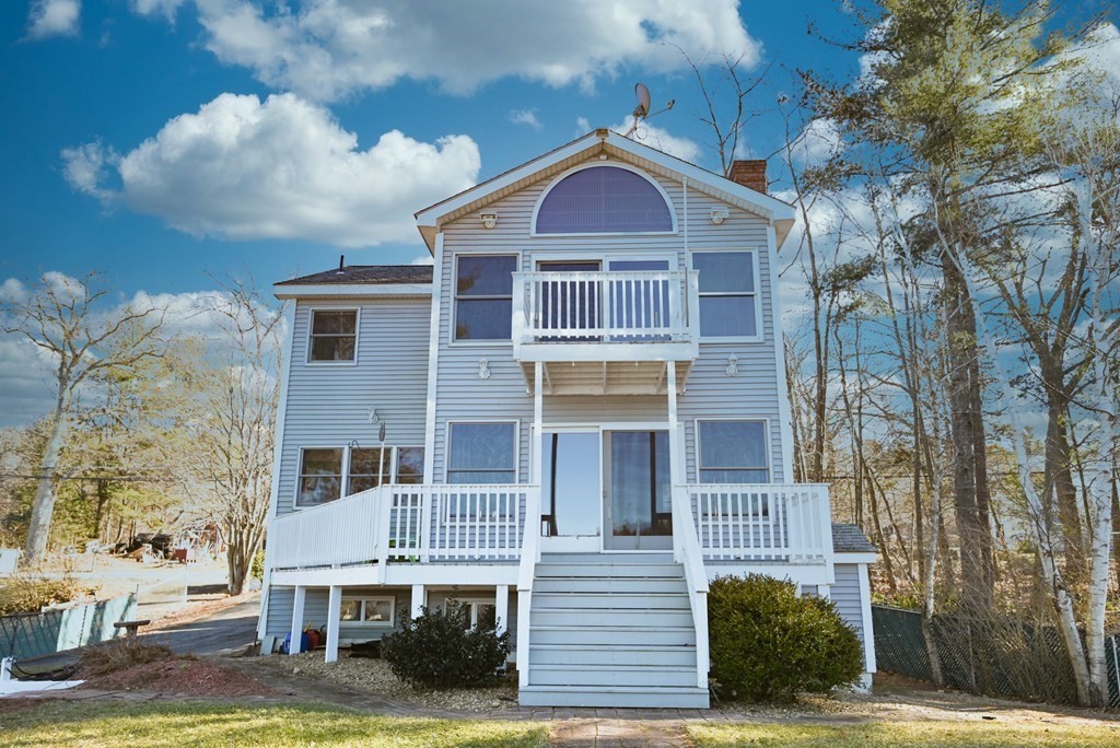 141 Ashby Road Ashburnham, MA 01430 - Photo 1 of 30 a front view of a house with garden