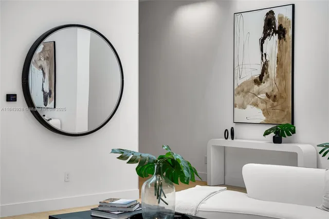 a bathroom with a sink and mirror