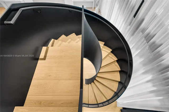 a bedroom with a bed and a lamp