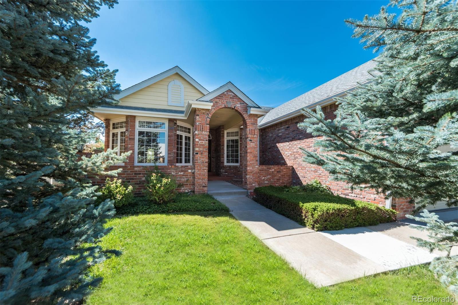 14 Hathaway Lane Highlands Ranch, CO 80130 - Photo 2 of 29 a view of a front of house with a yard