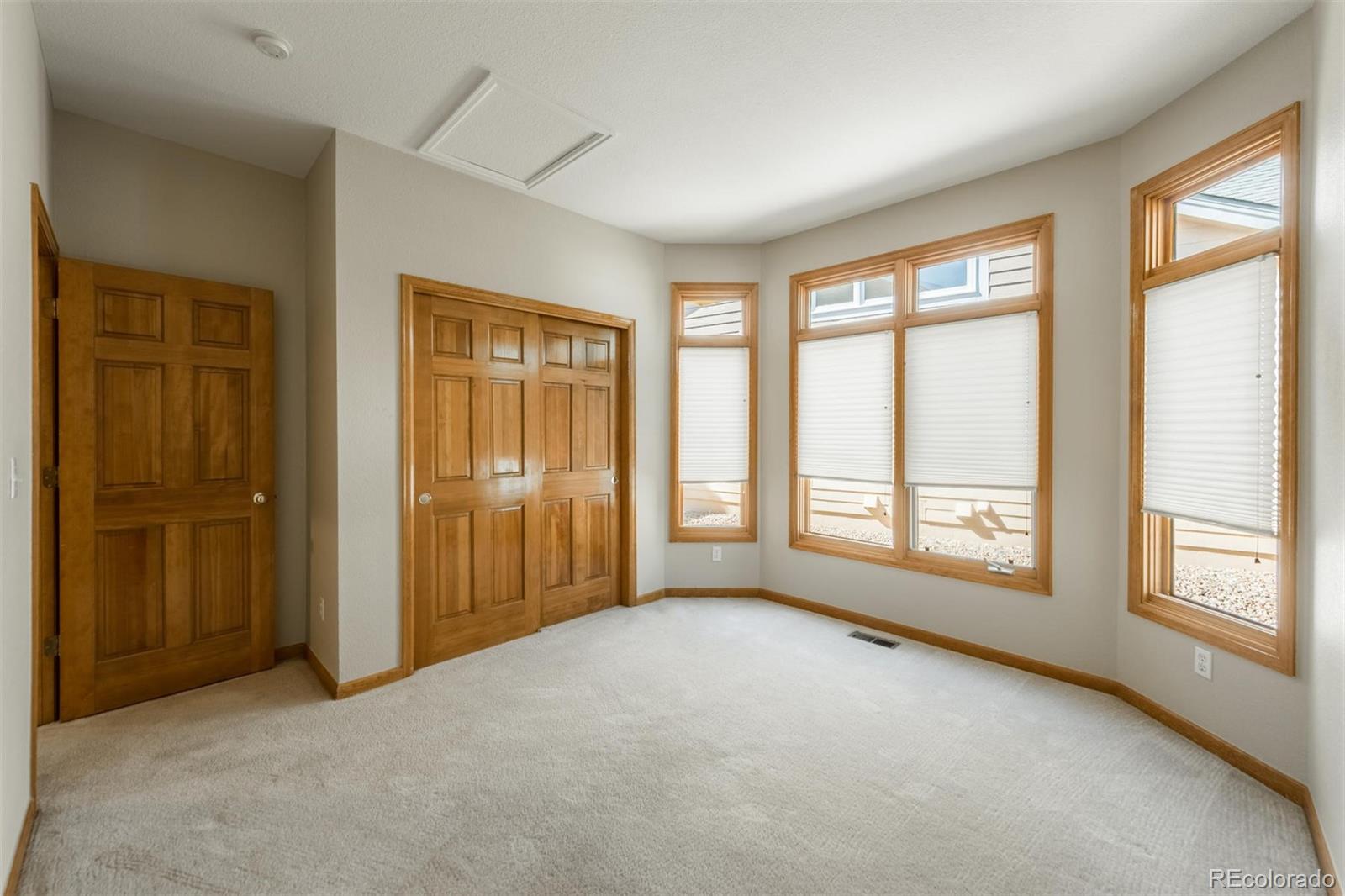 14 Hathaway Lane Highlands Ranch, CO 80130 - Photo 23 of 29 a view of an empty room with large windows