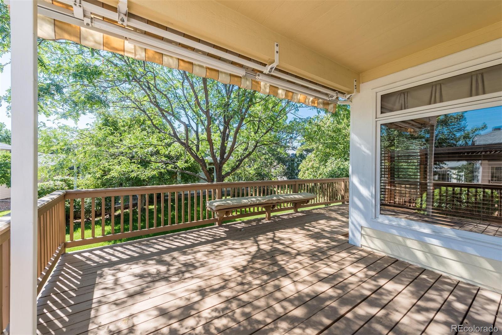 14 Hathaway Lane Highlands Ranch, CO 80130 - Photo 25 of 29 a view of a porch with a floor to ceiling window