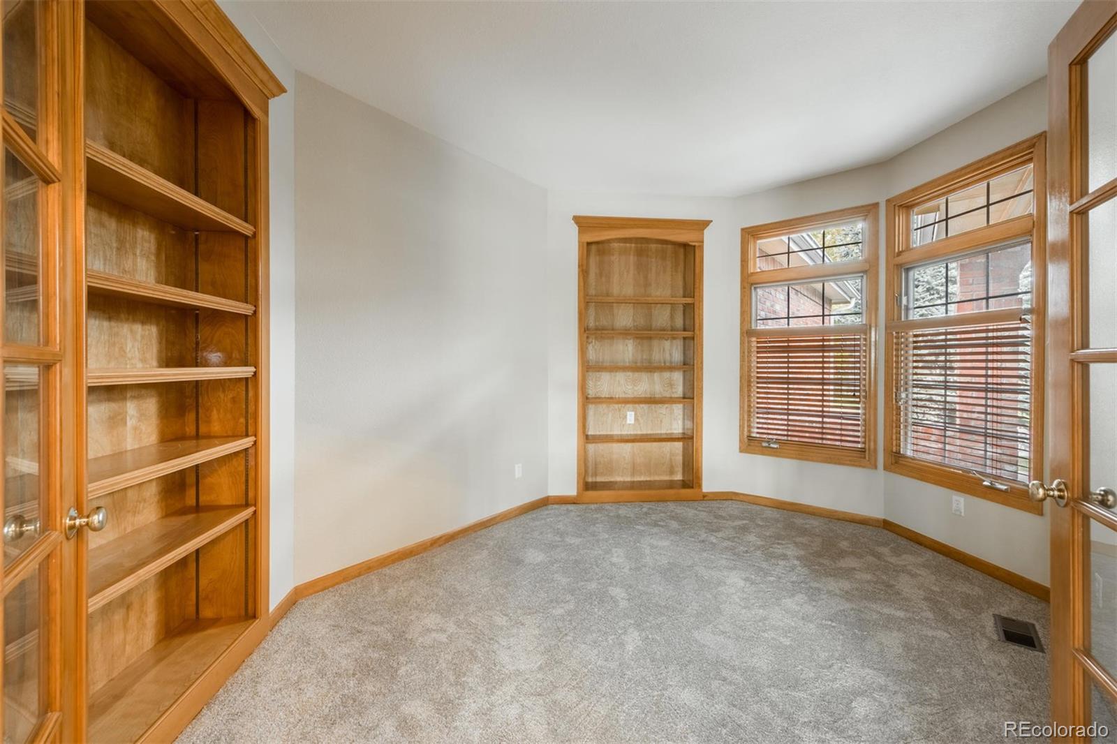 14 Hathaway Lane Highlands Ranch, CO 80130 - Photo 5 of 29 a view of an empty room with a window
