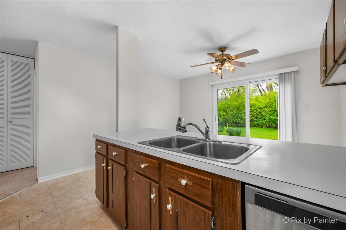 20 Red Oak Trail Cary, IL 60013 - Photo 12 of 27 a kitchen with a sink and a window