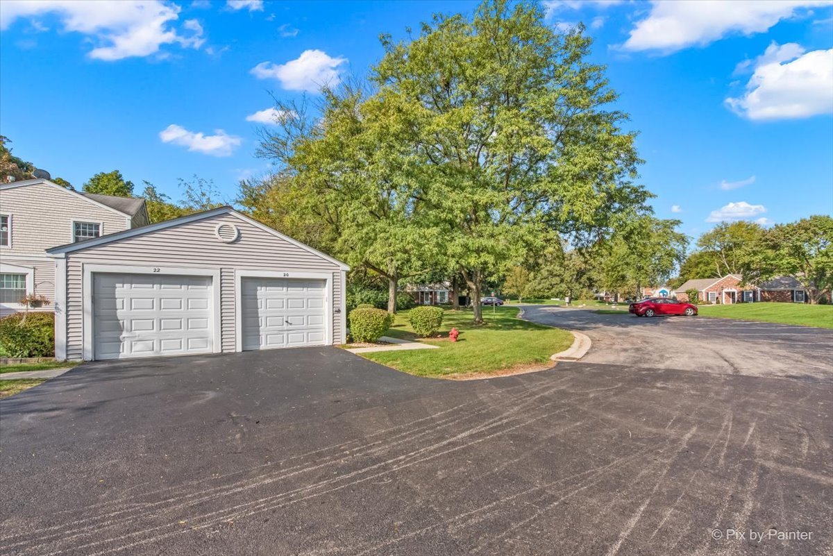 20 Red Oak Trail Cary, IL 60013 - Photo 21 of 27 a view of a house with a yard and garage