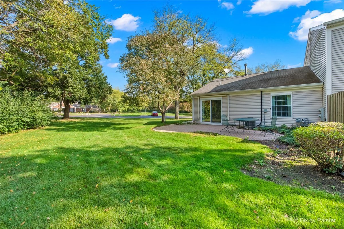 20 Red Oak Trail Cary, IL 60013 - Photo 25 of 27 a view of a house with a backyard
