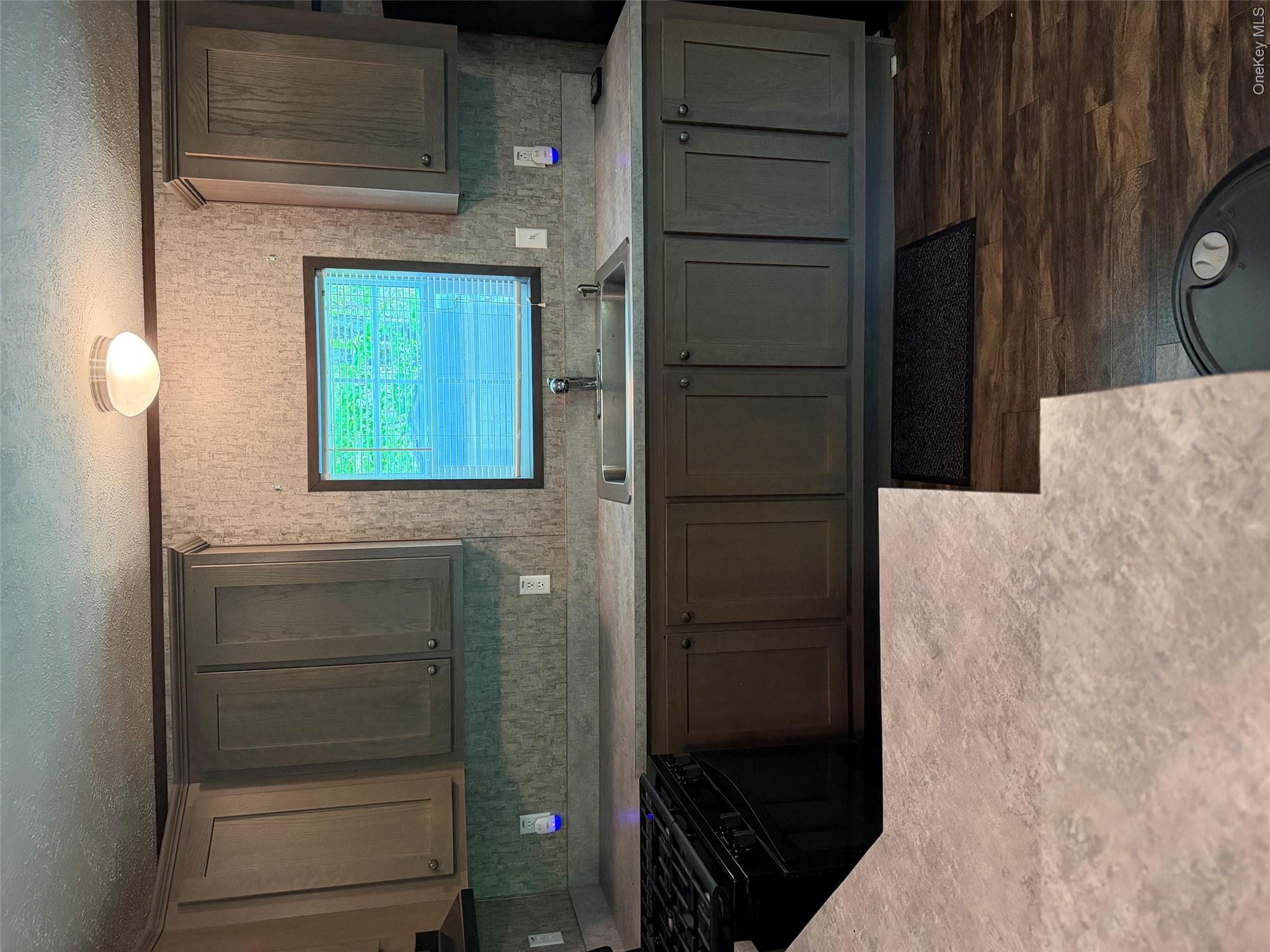 655 Samsonville Road Kerhonkson, NY 12446 - Photo 5 of 11 a kitchen with a sink and cabinets