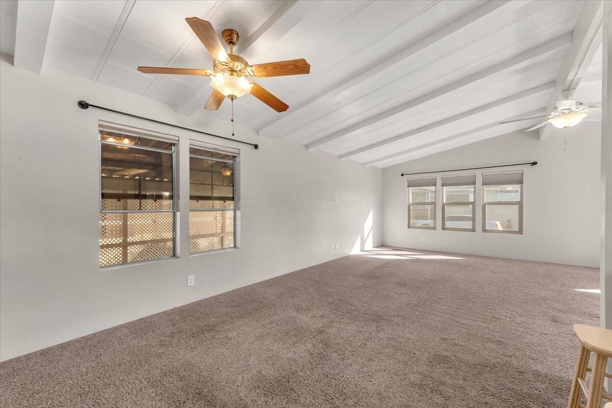 350 Gilmore Road, Unit SPC 16 Red Bluff, CA 96080 - Photo 18 of 35 an empty room with windows and ceiling fan