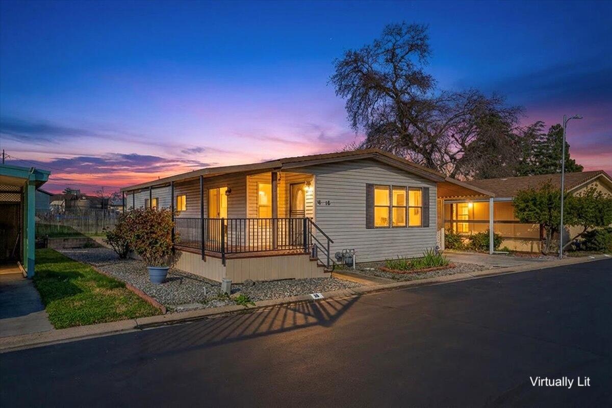 350 Gilmore Road, Unit SPC 16 Red Bluff, CA 96080 - Photo 2 of 35 a front view of a house with a yard