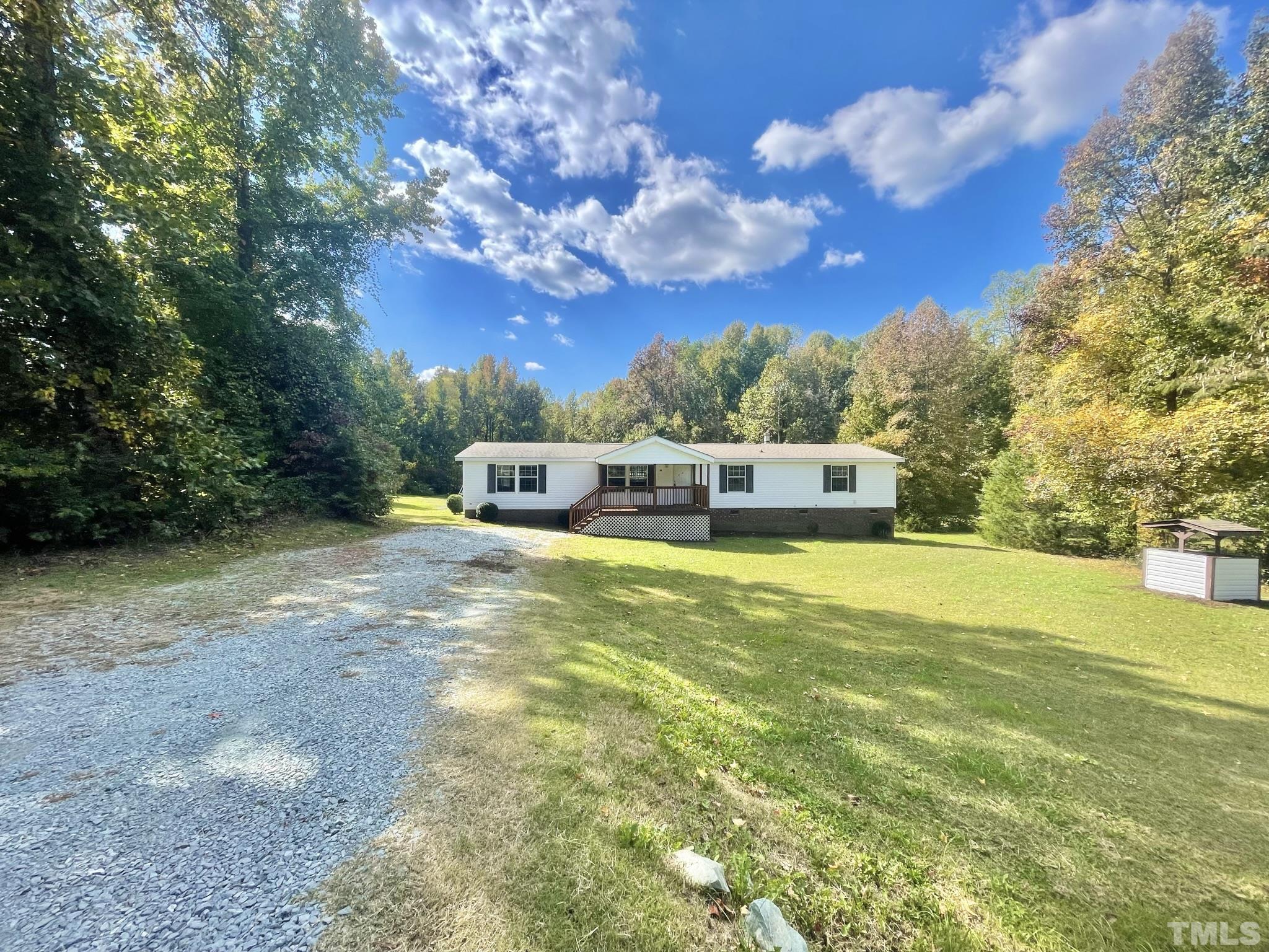 45 Divine Lane Roxboro, NC 27573 - Photo 1 of 28 a view of a house with a yard