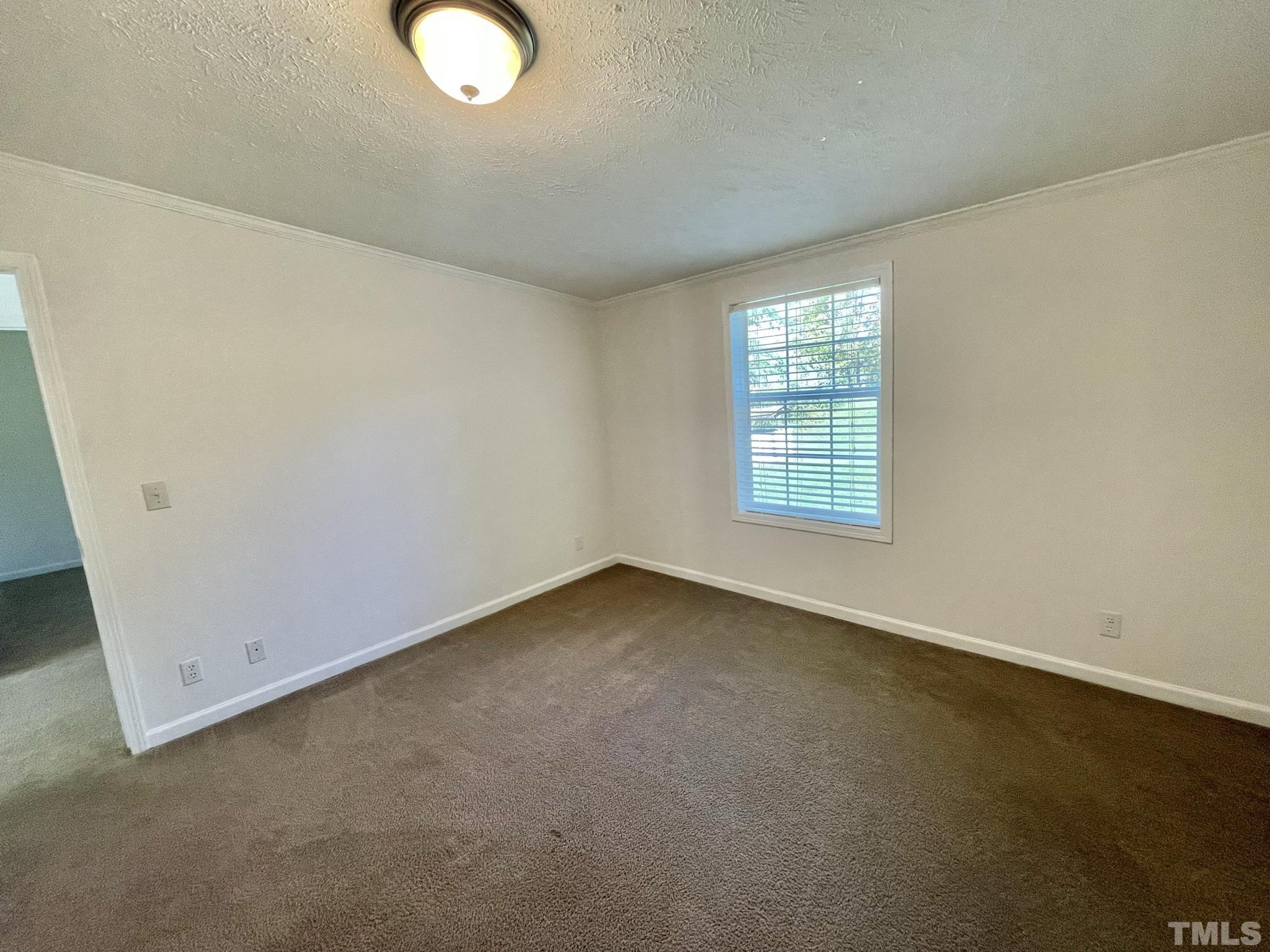 45 Divine Lane Roxboro, NC 27573 - Photo 22 of 28 an empty room with a window