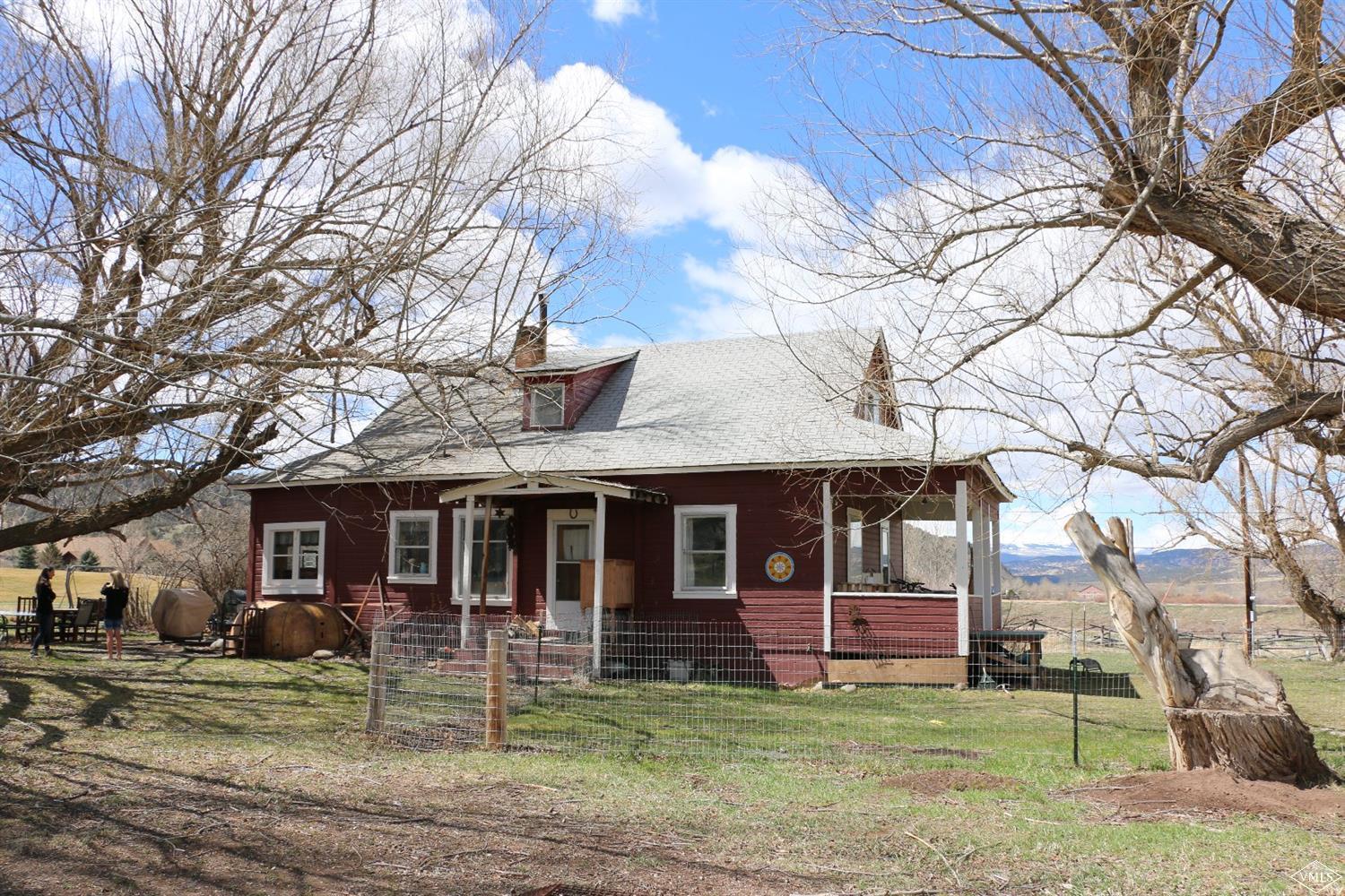 1500 Sylvan Lake Road Eagle, CO 81631 - Photo 2 of 10 a front view of a house with a yard