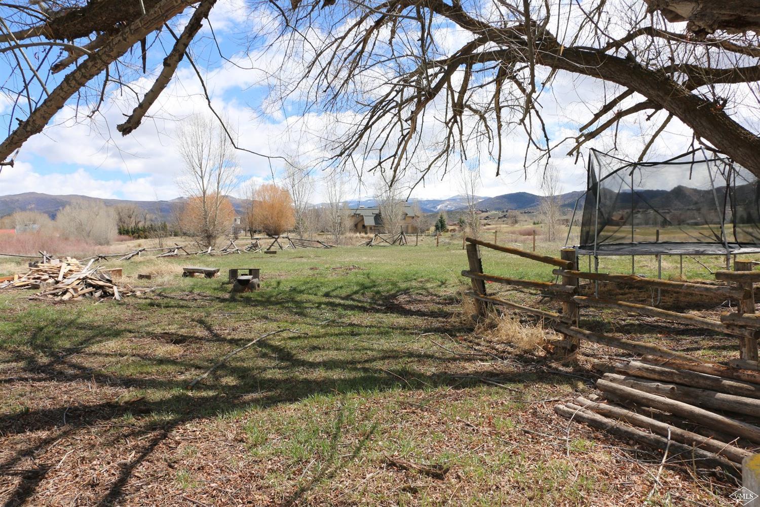 1500 Sylvan Lake Road Eagle, CO 81631 - Photo 3 of 10 a view of a yard with an outdoor space