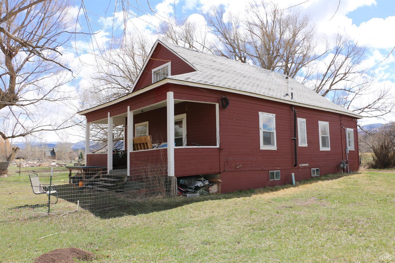 1500 Sylvan Lake Road Eagle, CO 81631 - Photo 5 of 10 a front view of a house with a yard
