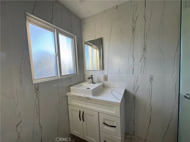 a view of kitchen and dining room with furniture