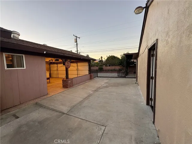 a view of a house with a street