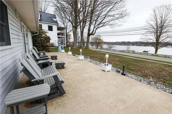 a view of a patio with a yard