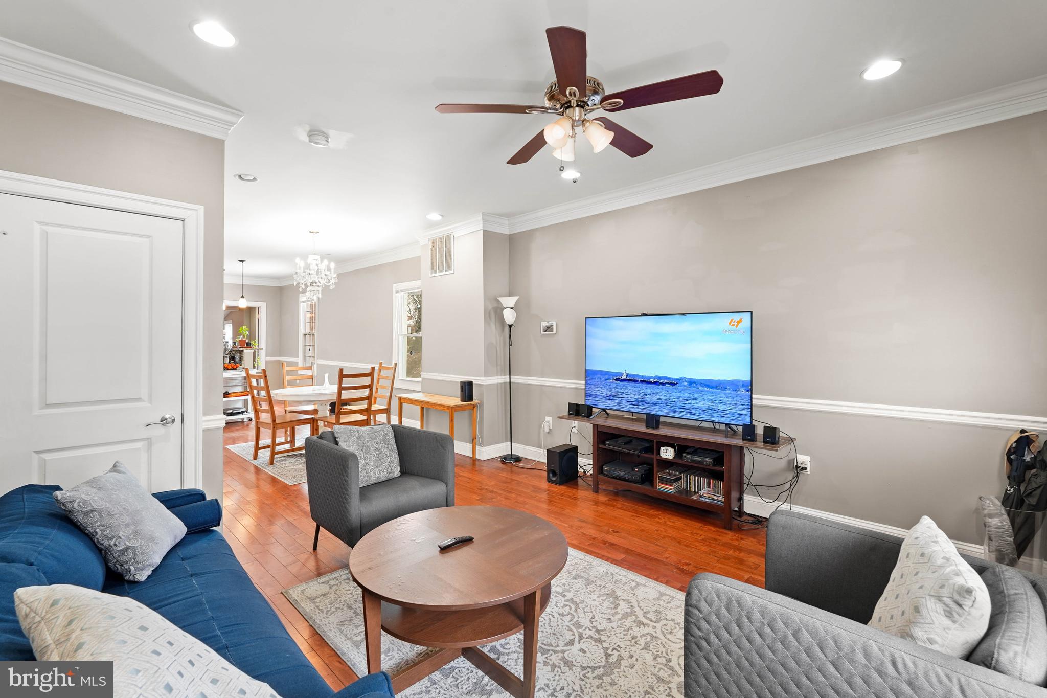 5013 The Alameda Baltimore, MD 21239 - Photo 3 of 24 a living room with furniture and a flat screen tv