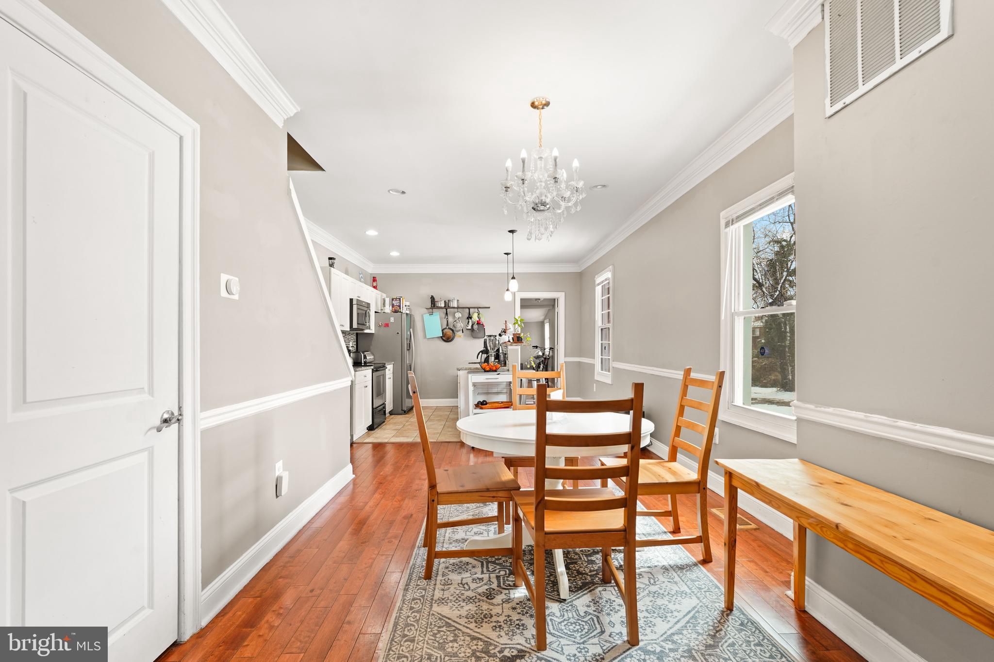 5013 The Alameda Baltimore, MD 21239 - Photo 4 of 24 a view of a dining room with furniture window and wooden floor