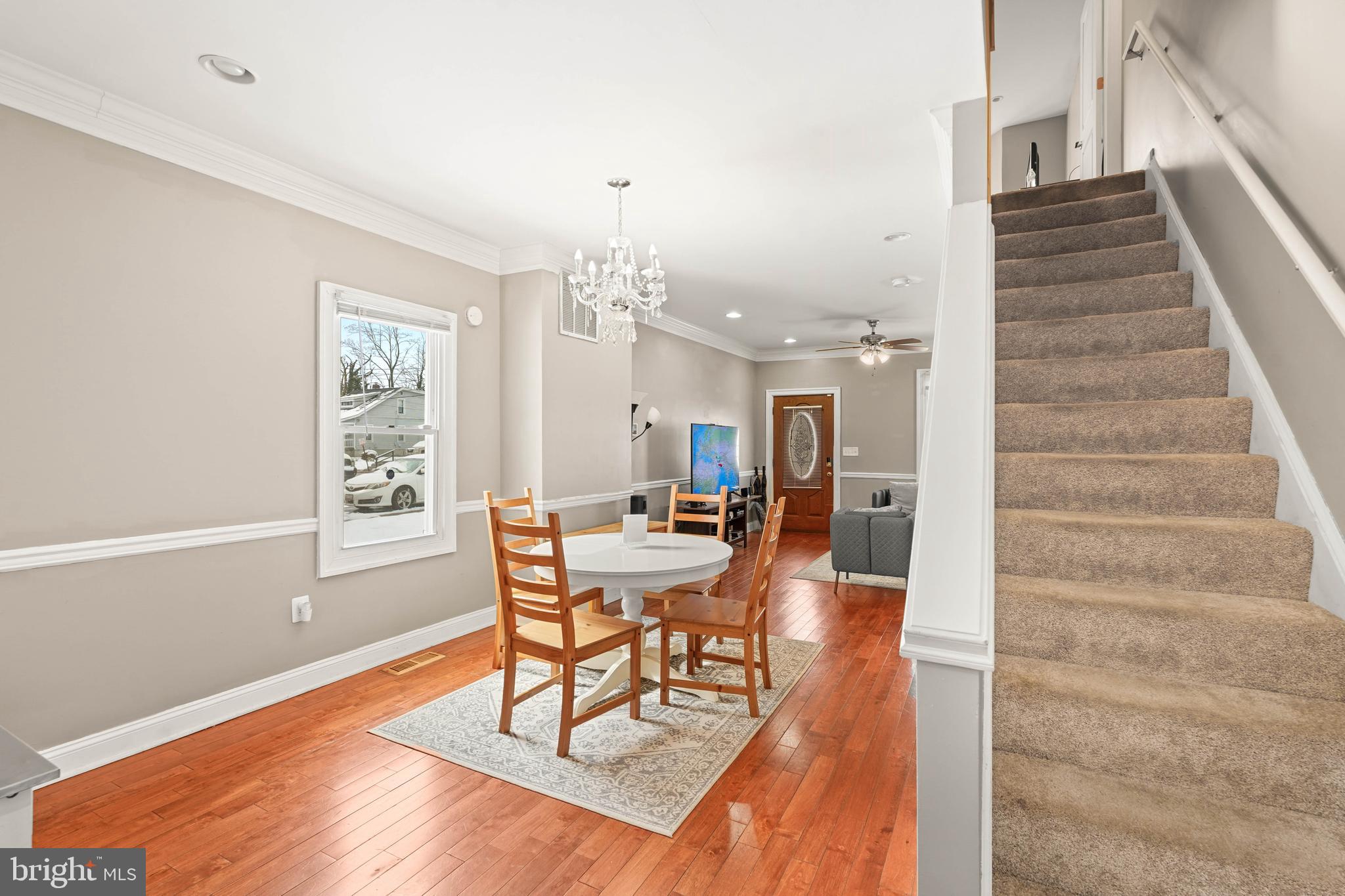 5013 The Alameda Baltimore, MD 21239 - Photo 8 of 24 a dining room with furniture and wooden floor