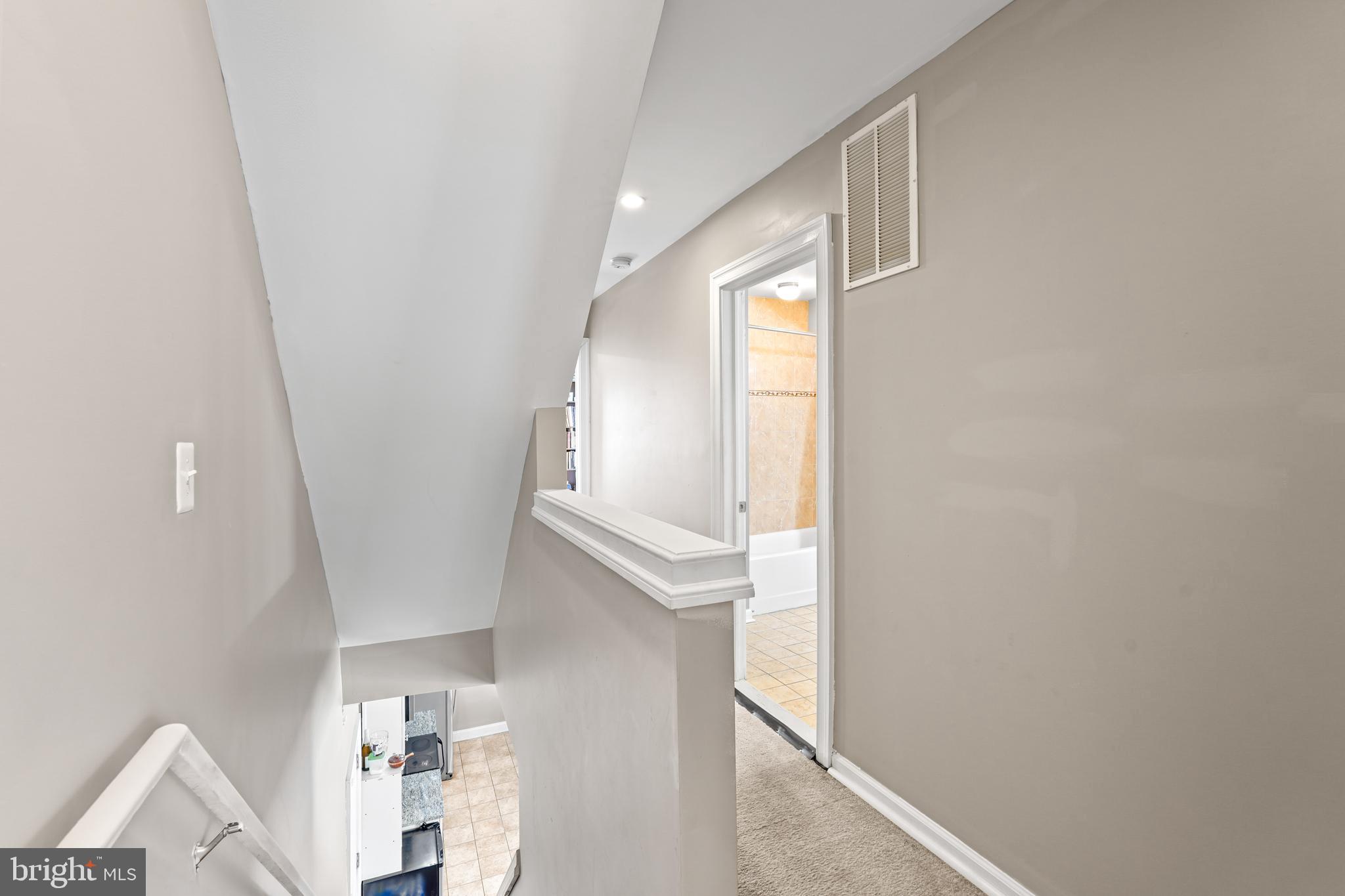 5013 The Alameda Baltimore, MD 21239 - Photo 9 of 24 a view of front door and bedroom