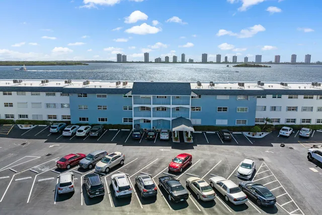 a swimming pool with outdoor seating and yard