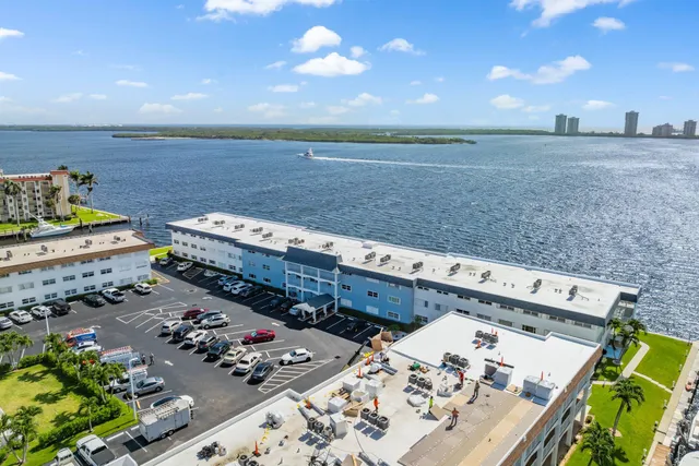 a view of a swimming pool with a lounge chair