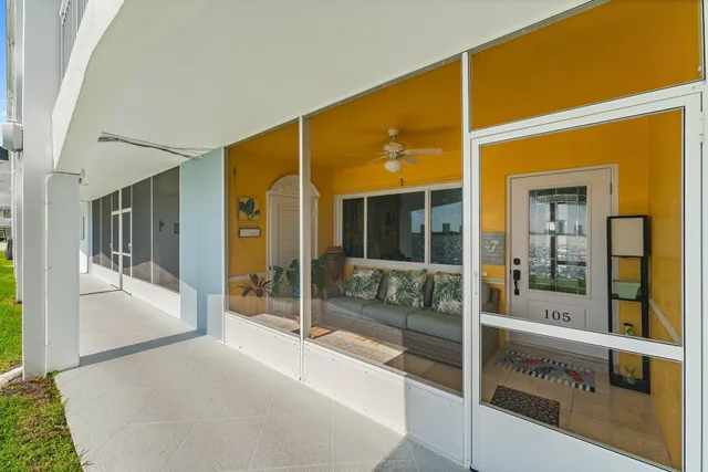 a bathroom with a tub and mirror