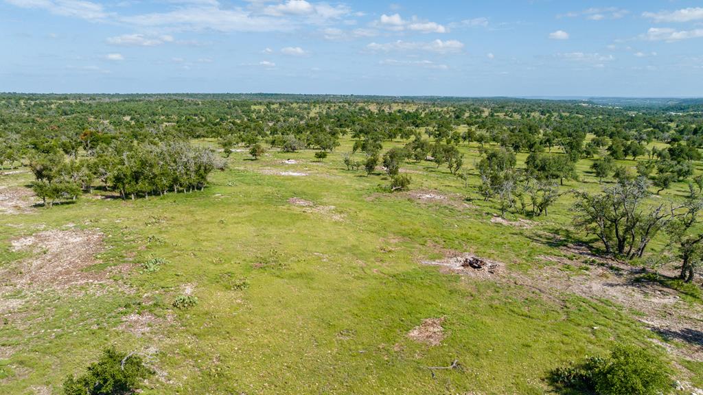 3 Loudon Road, Unit 3 Fredericksburg, TX 78624 - Photo 6 of 11 a view of a big yard with an outdoor space