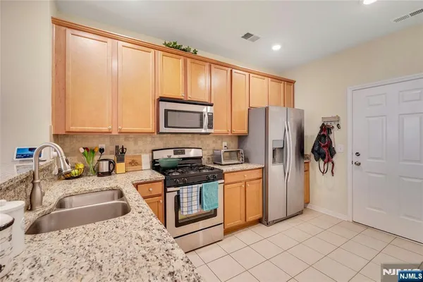 $449,000 | 10 Iris Lane, Unit 605, Garfield, NJ 07026