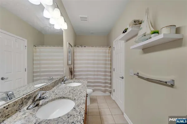 $449,000 | 10 Iris Lane, Unit 605, Garfield, NJ 07026