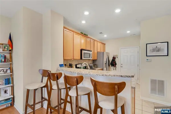 $449,000 | 10 Iris Lane, Unit 605, Garfield, NJ 07026