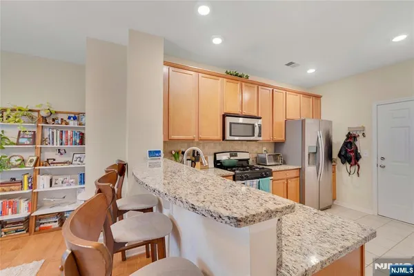 $449,000 | 10 Iris Lane, Unit 605, Garfield, NJ 07026