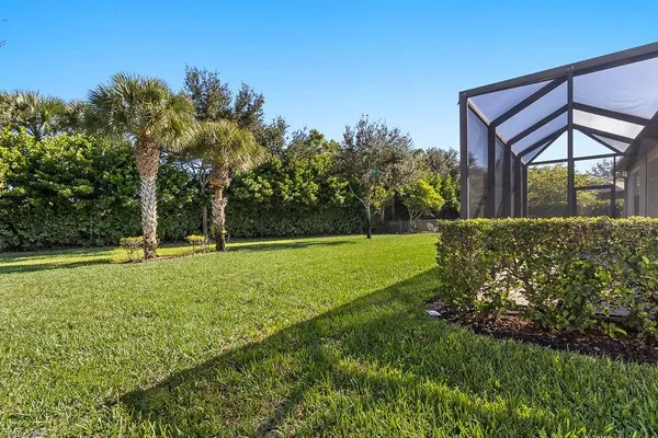 a view of an empty room and bathroom