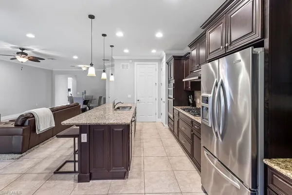 a view of a green field with sitting area