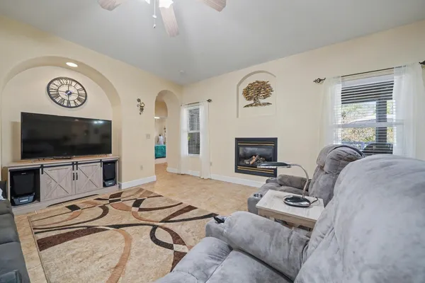 a kitchen with a refrigerator and a sink