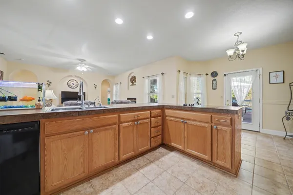 a bedroom with bed and a window