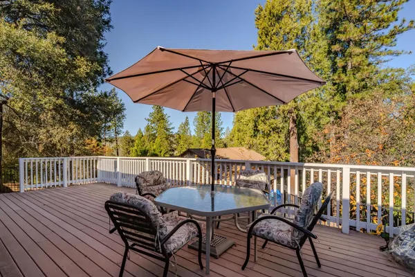 a bedroom with a bed and ceiling fan
