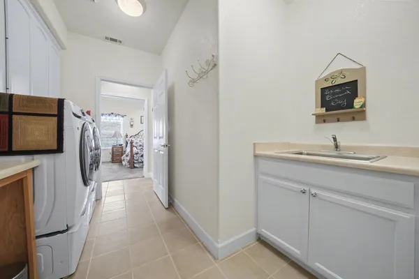a view of workspace with furniture and windows