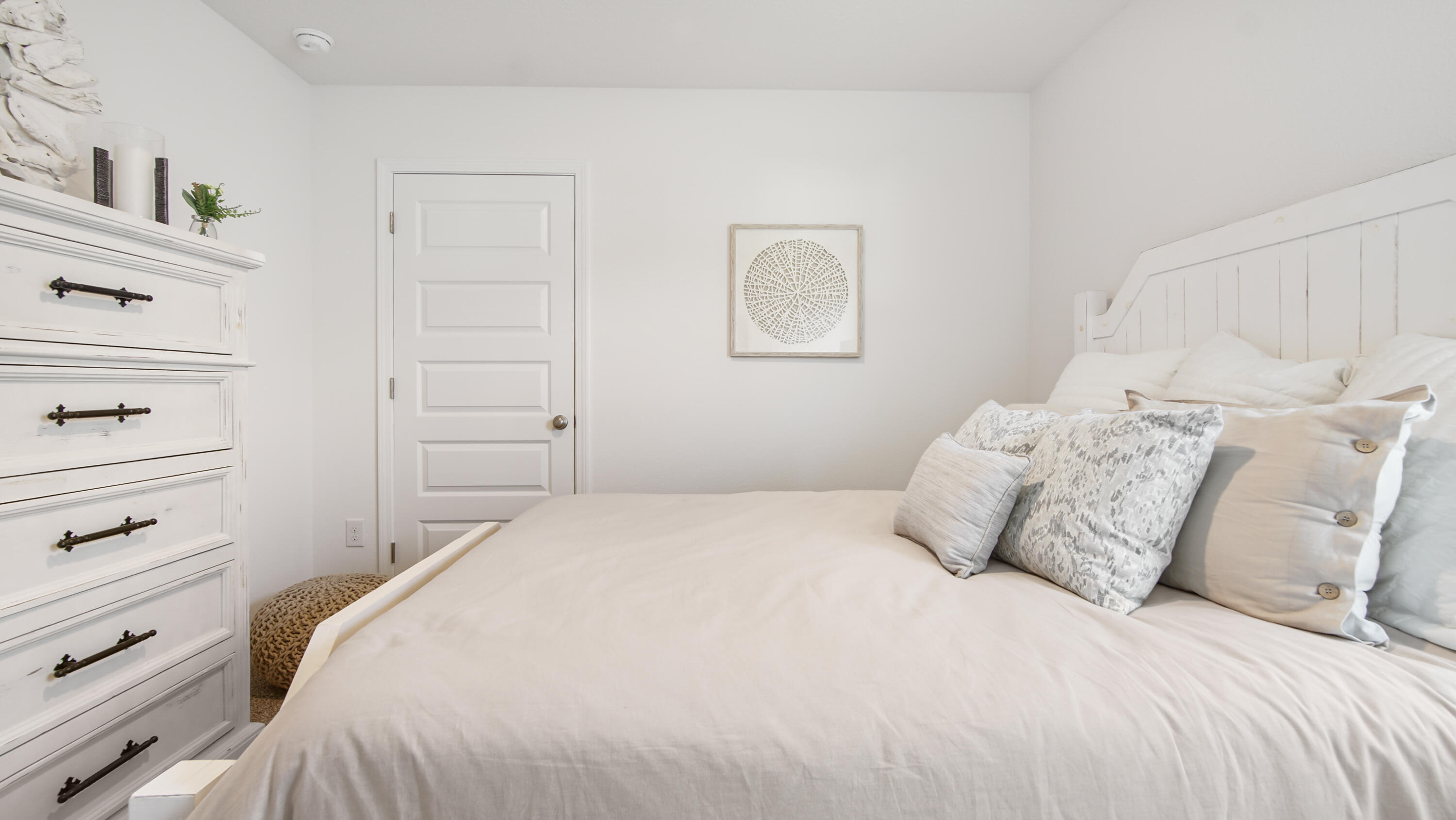 23 Riverwalk Circle Freeport, FL 32439 - Photo 23 of 35 a bedroom with a bed and a window