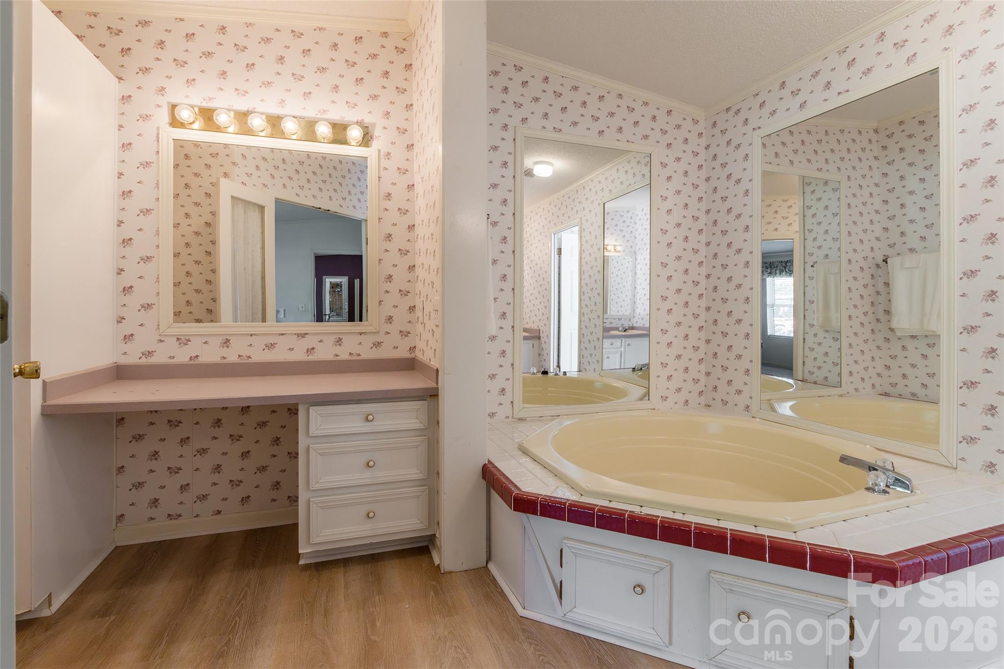 777 John Doster Road Pageland, SC 29728 - Photo 20 of 34 a bathroom with a tub sink and mirror